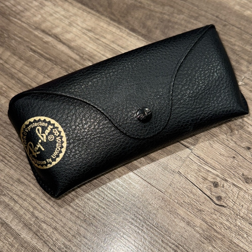 Ray-Ban case. Black & gold lettering.